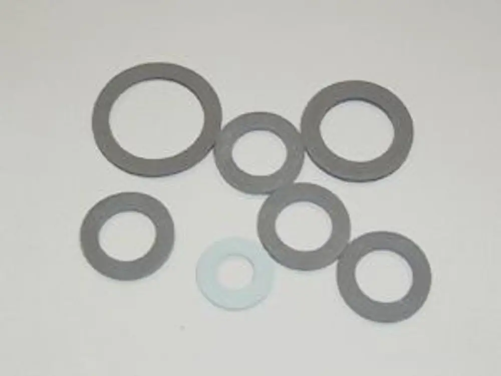 Scheiben aus EPDM-Gummi in verschiedenen Durchmessern und Dicken, die von der Marke Remeha stammen. Sie sind in einem klar strukturierten Arrangement angeordnet.